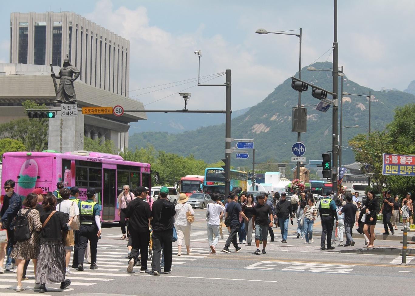 Image of city of Seoul South Korea with Buhkan Mountain in the background - photo by Tim Beatley