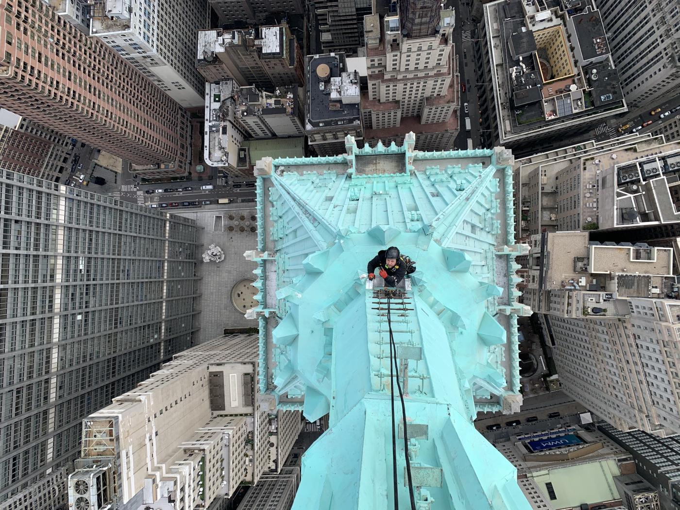 Alum William Canup at work on the Bank of Manhattan Trust Building